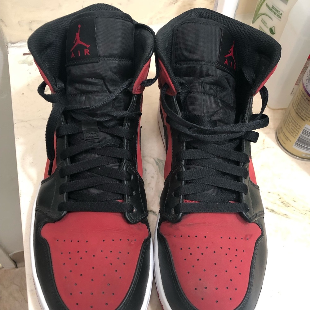 Jordan 1s red & black NEGOTIABLE.